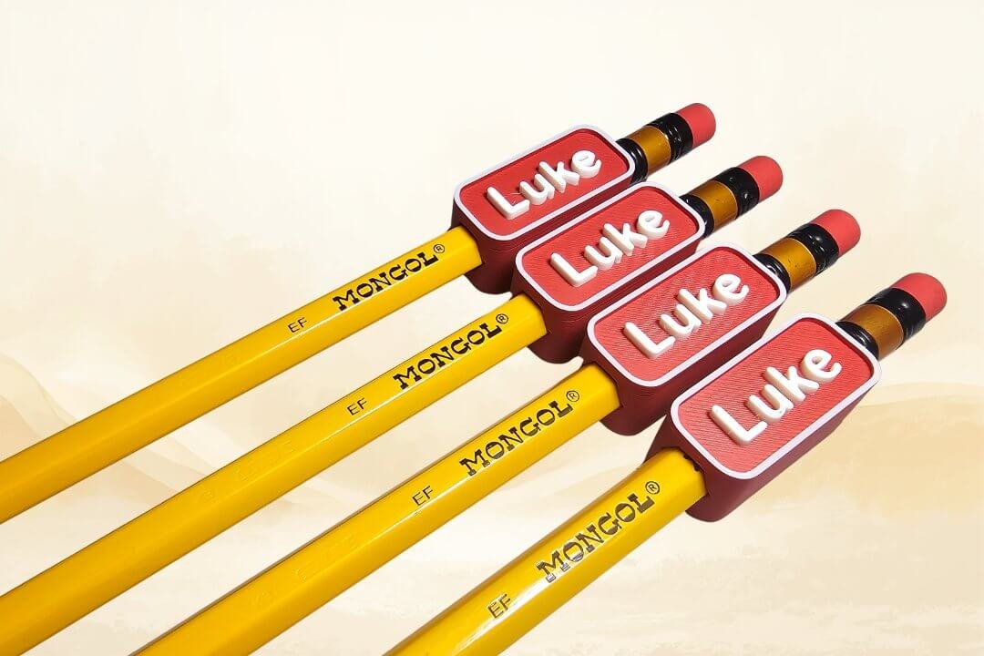 mypolybox-mongol-pencil-topper-red-custom-name-4-pieces-philippines Four MYPOLYBOX custom Mongol pencil toppers with raised name lettering fitted on yellow Mongol pencils