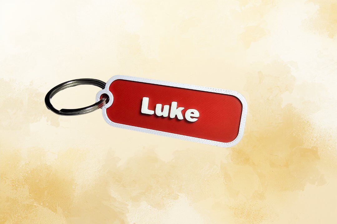 mypolybox-name-tag-keychain-medium-red-custom-name-philippines MYPOLYBOX Medium name tag keychain with silver split ring — custom 3D printed in red and white Philippines